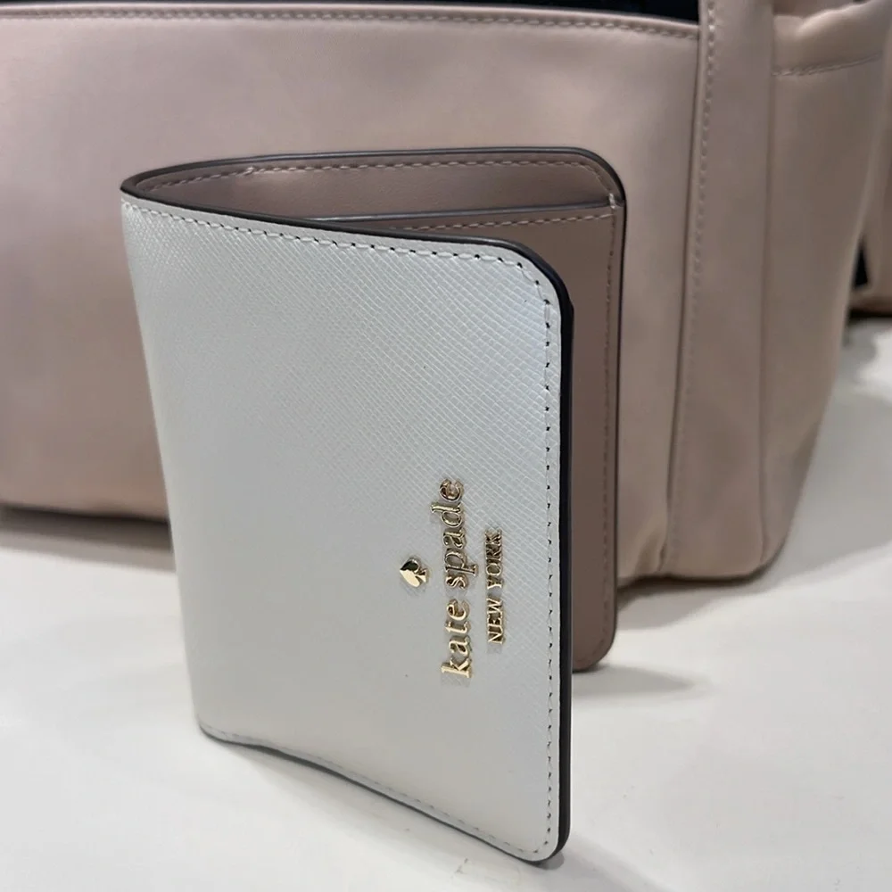Kate Spade Madison Small Bifold Wallet
Meringue 
NWT - Picture 12 of 16